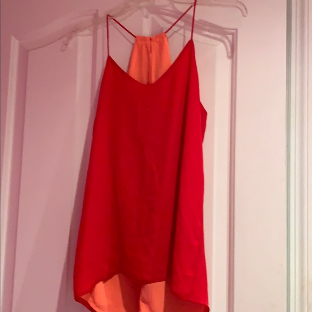 Red dressy top . Pretty color .